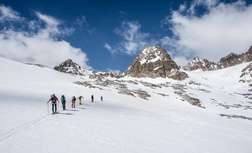 Group of ski tourers in winter in the mountains
