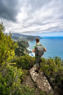 Hiker standing on a rock
