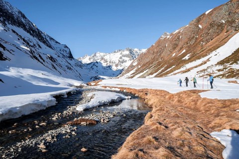 Ski tourers in Oberbergtal with Oberbergbach