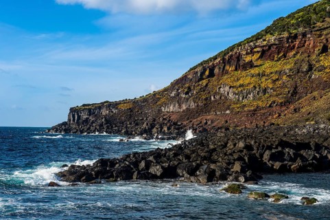 Rocky volcanic coastline around Sao Mateus