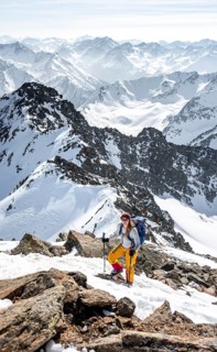 Mountaineer at the summit of the Sulzkogel