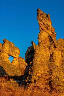 Savannah and huge rock formations at sunset in the Isalo National Park