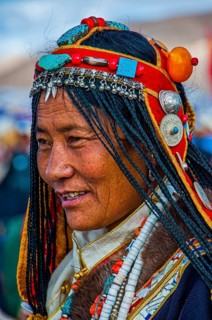 Traditional dressed woman on the festival of the tribes in Gerze Western Tibet