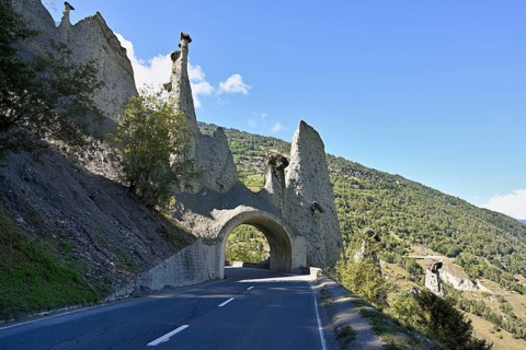 Road tunnel through earth pyramids of Euseigne