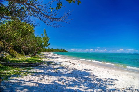 Long white sand beach in the east of the island Ile Sainte-Marie although Nosy Boraha
