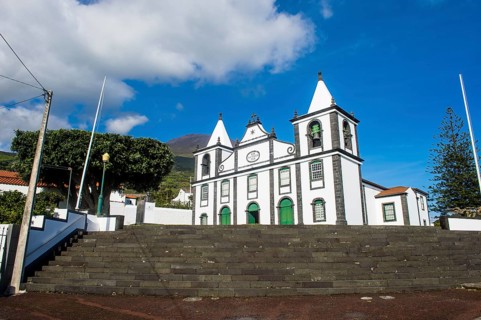 Paroquia de Sao Mateus church below Ponta do Pico highest mountain of Portugal