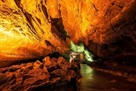Stunning Verdes Cave with colorful illumination