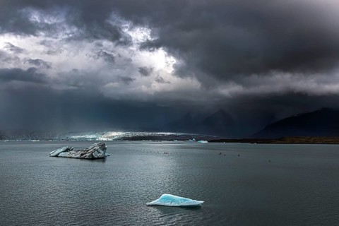 Chunks of ice from the Breioamerkurjoekull glacier floating on the Arctic Ocean in the Joekulsarlon glacier lagoon in Iceland