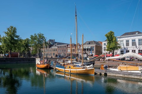 Historic ships in the museum harbour at the Old Harbour