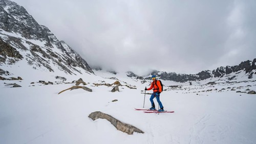 Skiers on the descent
