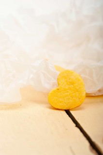 Fresh baked heart shaped shortbread valentine day cookies on a paper wrap