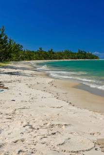 Long white sand beach in the east of the island Ile Sainte-Marie although Nosy Boraha