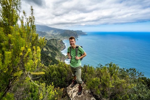 Hiker standing on a rock