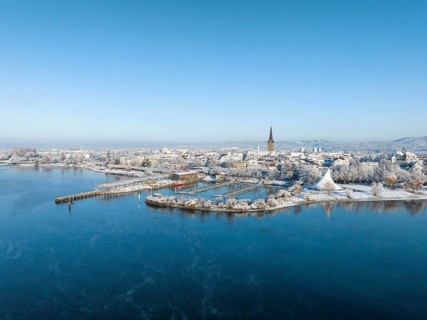 Aerial view of the town of Radolfzell on Lake Constance in winter with the harbour pier and Waeschbruckhafen
