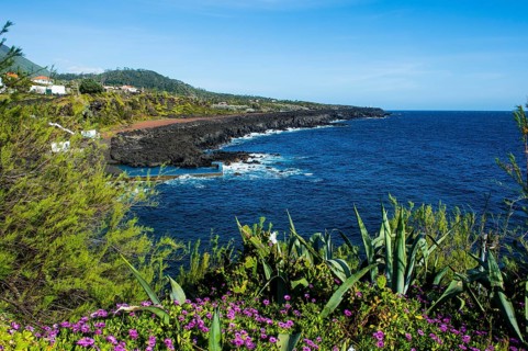 Rocky volcanic coastline around Sao Mateus