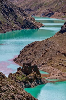 Turquoise lake on the Karo-La Pass along the Friendship Highway