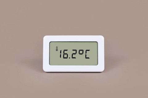 Digital thermometer showing cold room temperature of 16.7 degree Celsius