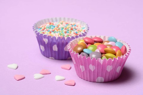 Chocolate lentils and love beads in paper moulds