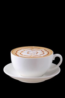 Big ceramic cup of cappuccino on saucer on black background