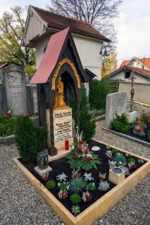 Grave with flower decoration