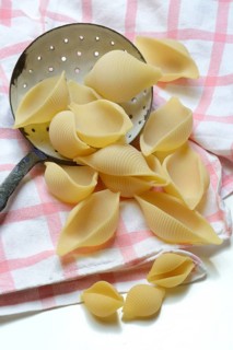 Conchiglione and small conchiglie with sieve ladle