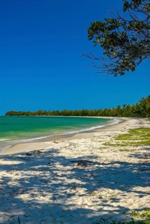 Long white sand beach in the east of the island Ile Sainte-Marie although Nosy Boraha