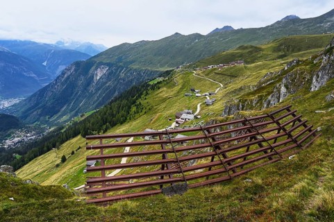 Metal avalanche barrier above the village