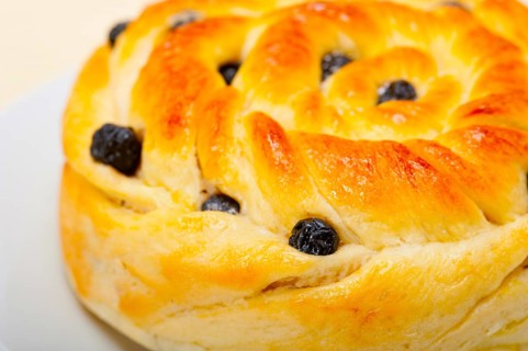 Fresh home baked blueberry bread cake dessert over white wood table
