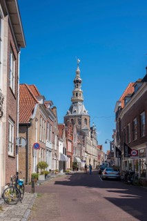 Town hall and historic house facades in Meelstraat