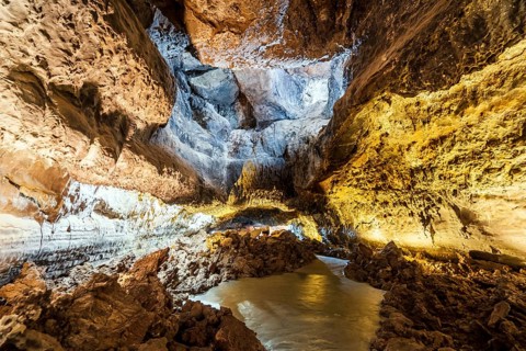 Stunning Verdes Cave with colorful illumination