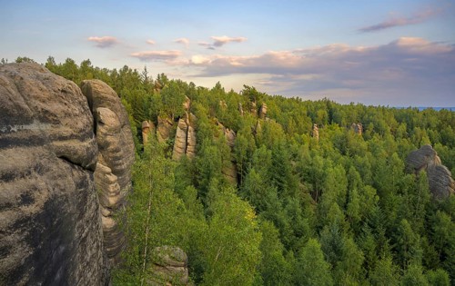 View of sandstone rocks in the evening light from a lookout pulpit