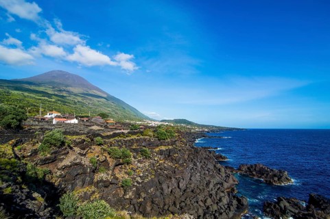Rocky coastline below Ponta do Pico highest mountain of Portugal