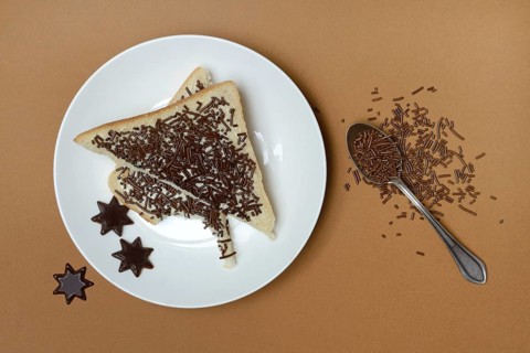 Toast with chocolate sprinkles on plate