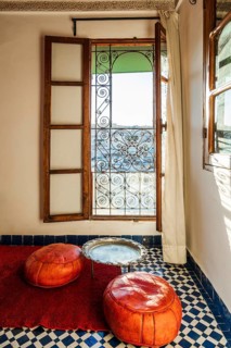 Traditional interior design of Moroccan rich house called riad with the view of downtown