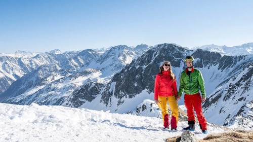 Two ski tourers at the summit