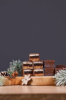 Halved taditional German sweets called 'Dominosteine'. Christmas candy consisting of gingerbread