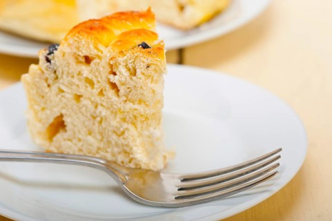 Fresh home baked blueberry bread cake dessert over white wood table