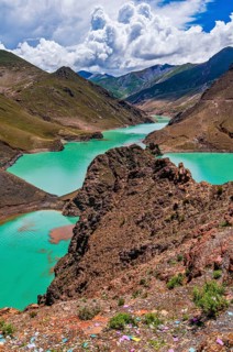 Turquoise lake on the Karo-La Pass along the Friendship Highway