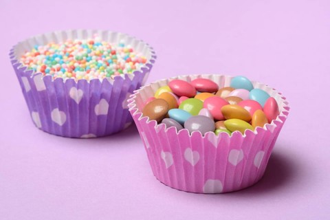 Chocolate lentils and love beads in paper moulds