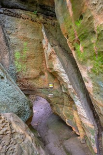 Low passage at the sandstone cliffs of