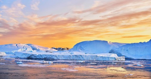 Gigantic icebergs in the evening light
