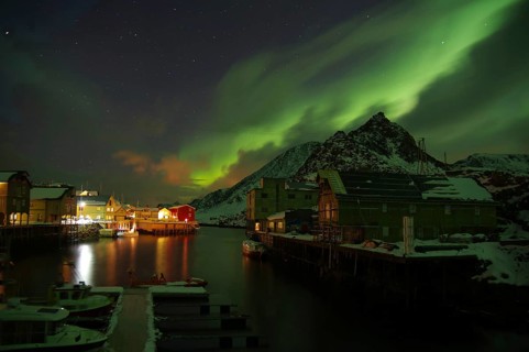 Small harbour with illuminated houses