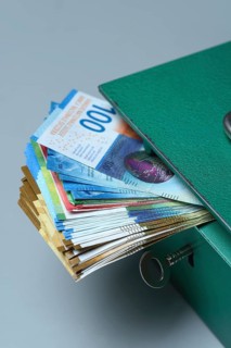 Cash box and Swiss banknotes