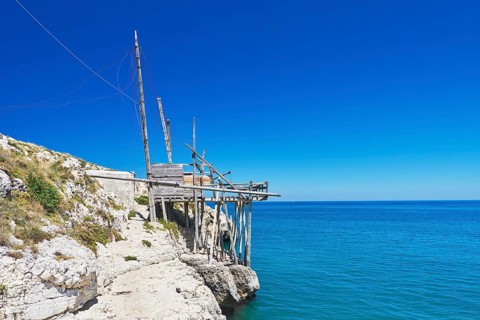 Fishing trabocco on rocky beach