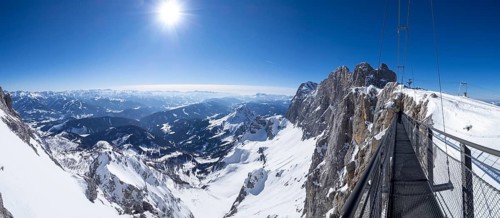 Blue sky over alpine winter landscape
