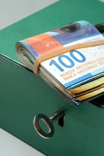 Cash box and Swiss banknotes
