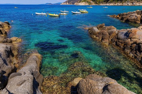 Boats anchored in the bay of Sant Andrea