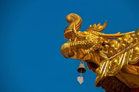 Buddhist roof decorations on the roof of the Tashilhunpo monastery