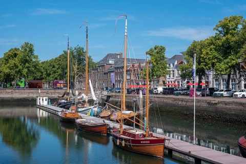 Historic ships in the museum harbour at the Old Harbour