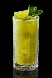 Matcha tea and lime lemonade with mint isolated on black background